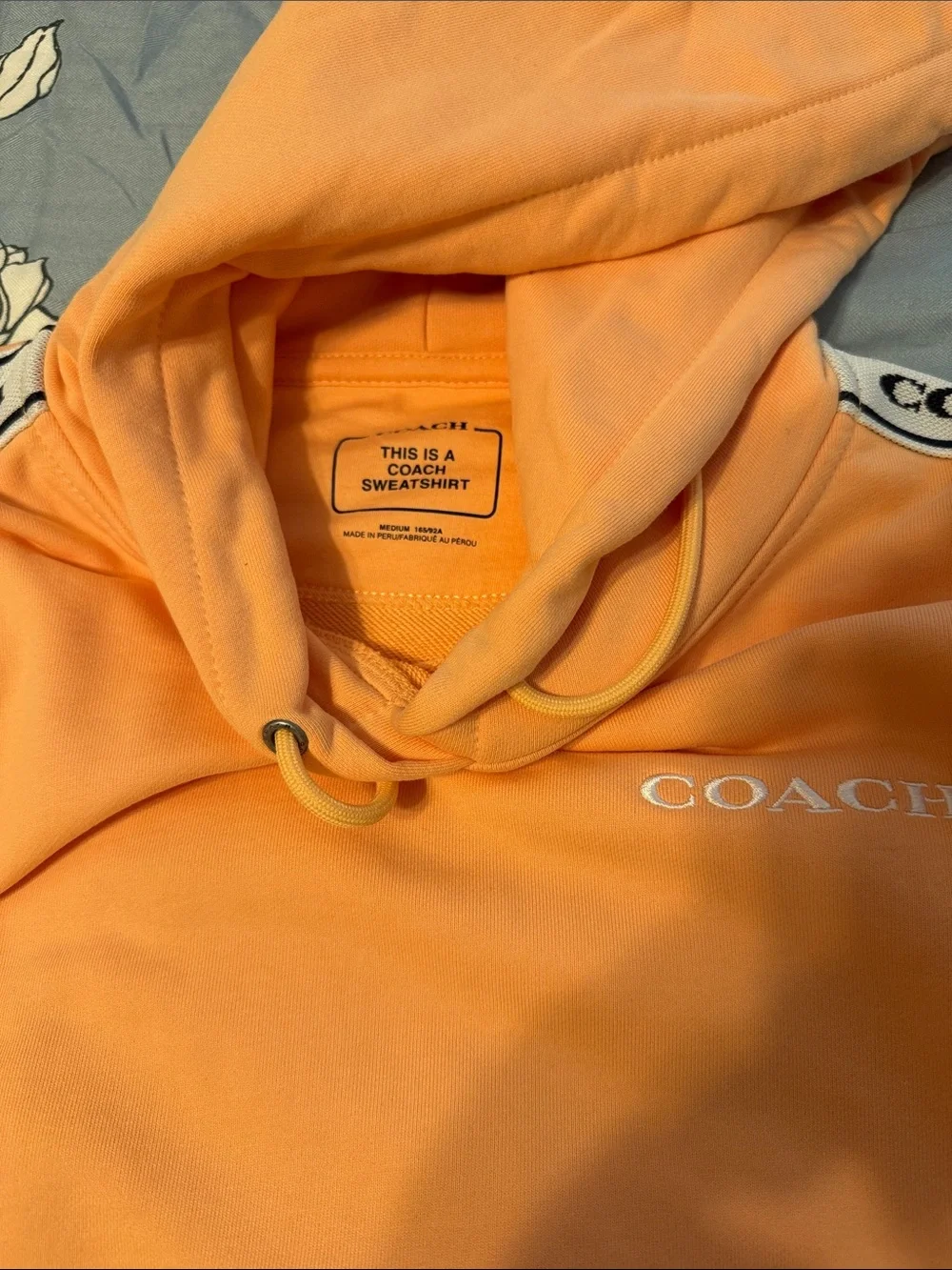Coach Peach Hoodie with Branded Shoulder Tape